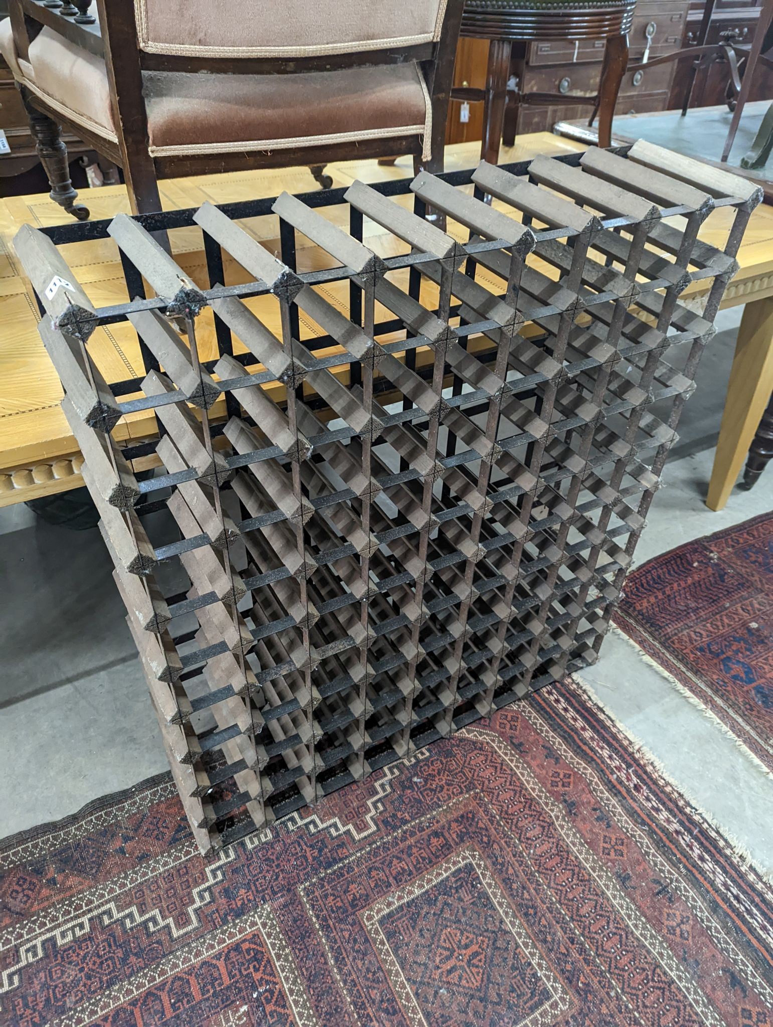 A 99 bottle wine rack, width 90cm